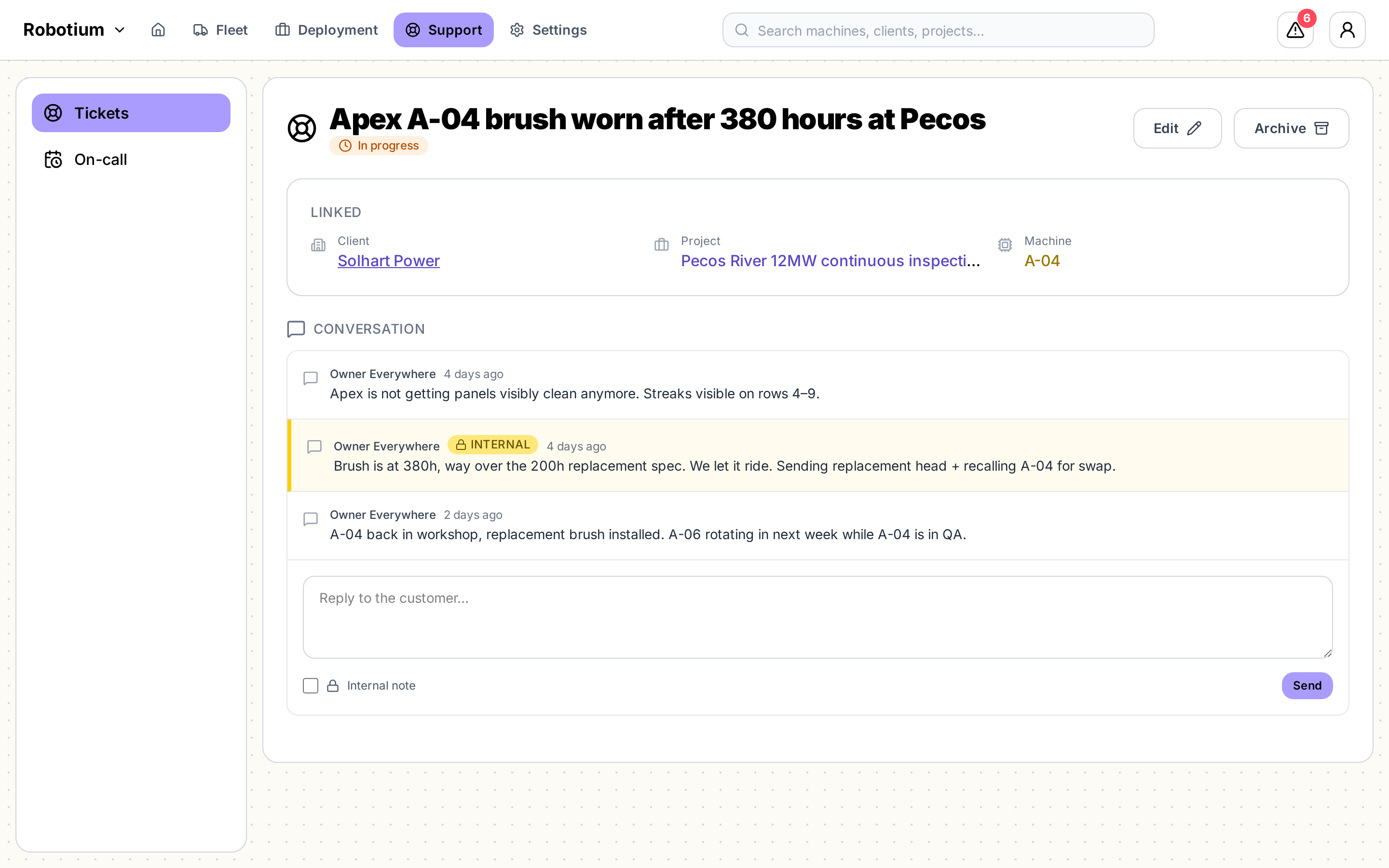 Support ticket with linked client, project and machine, and a threaded conversation